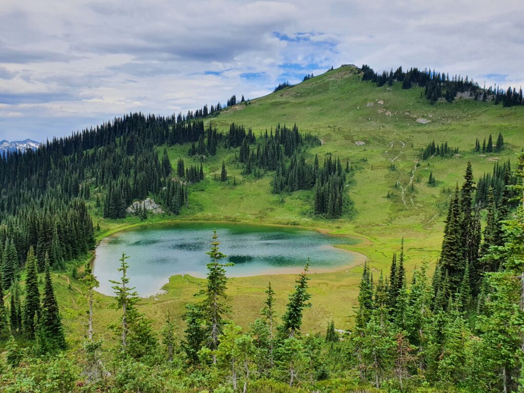 Looking down at Image Lake from an upper alpine bowl