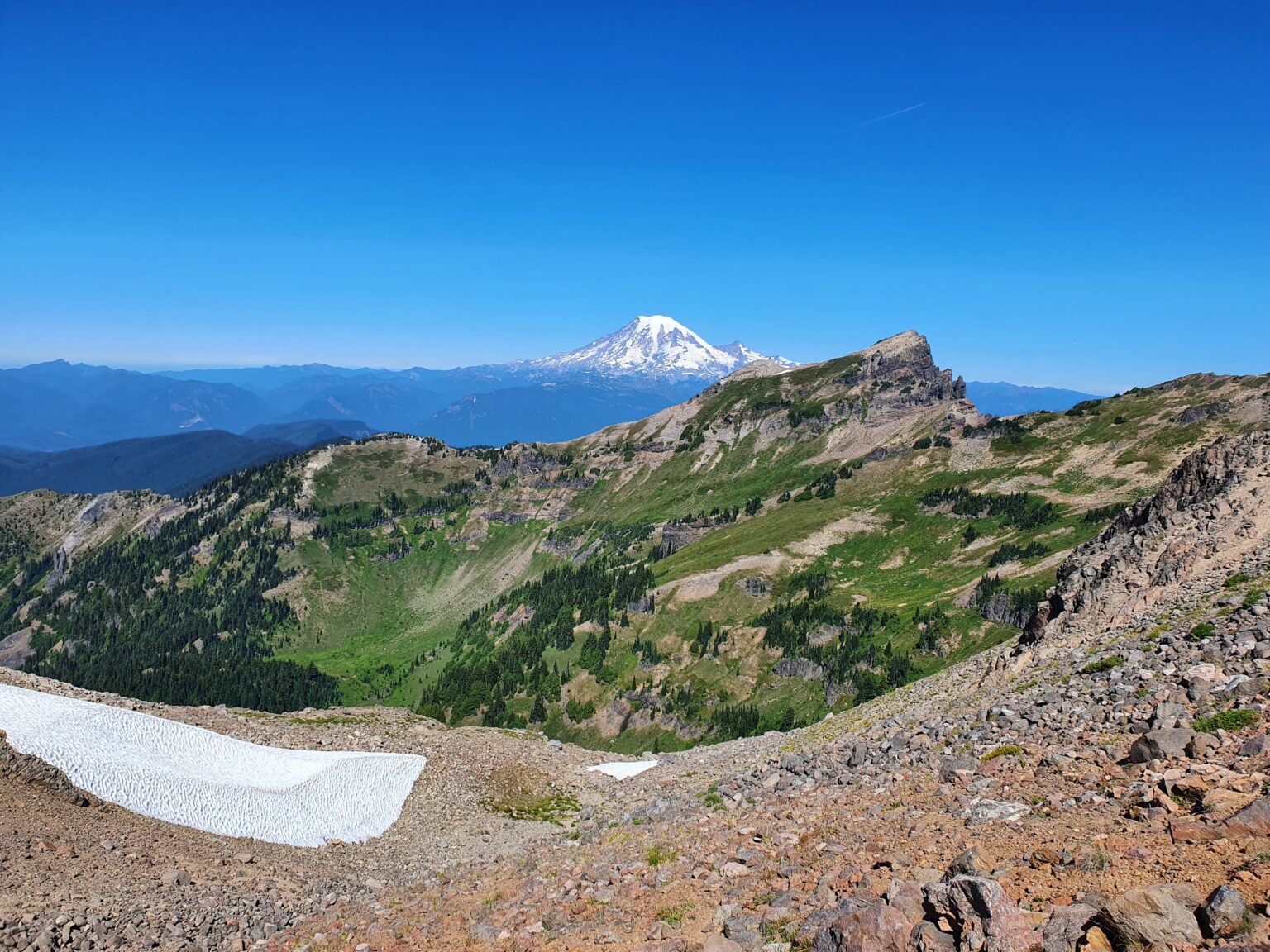 Looking north at Mount Rainier from the summit of Hawkeye Peak