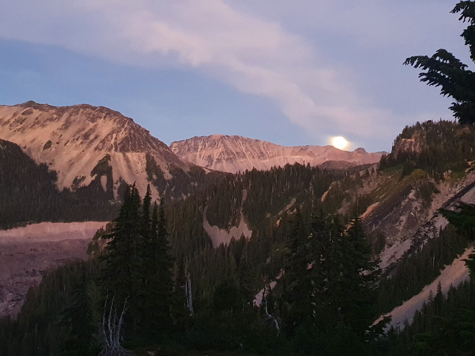 Watching the moon rise in the distance