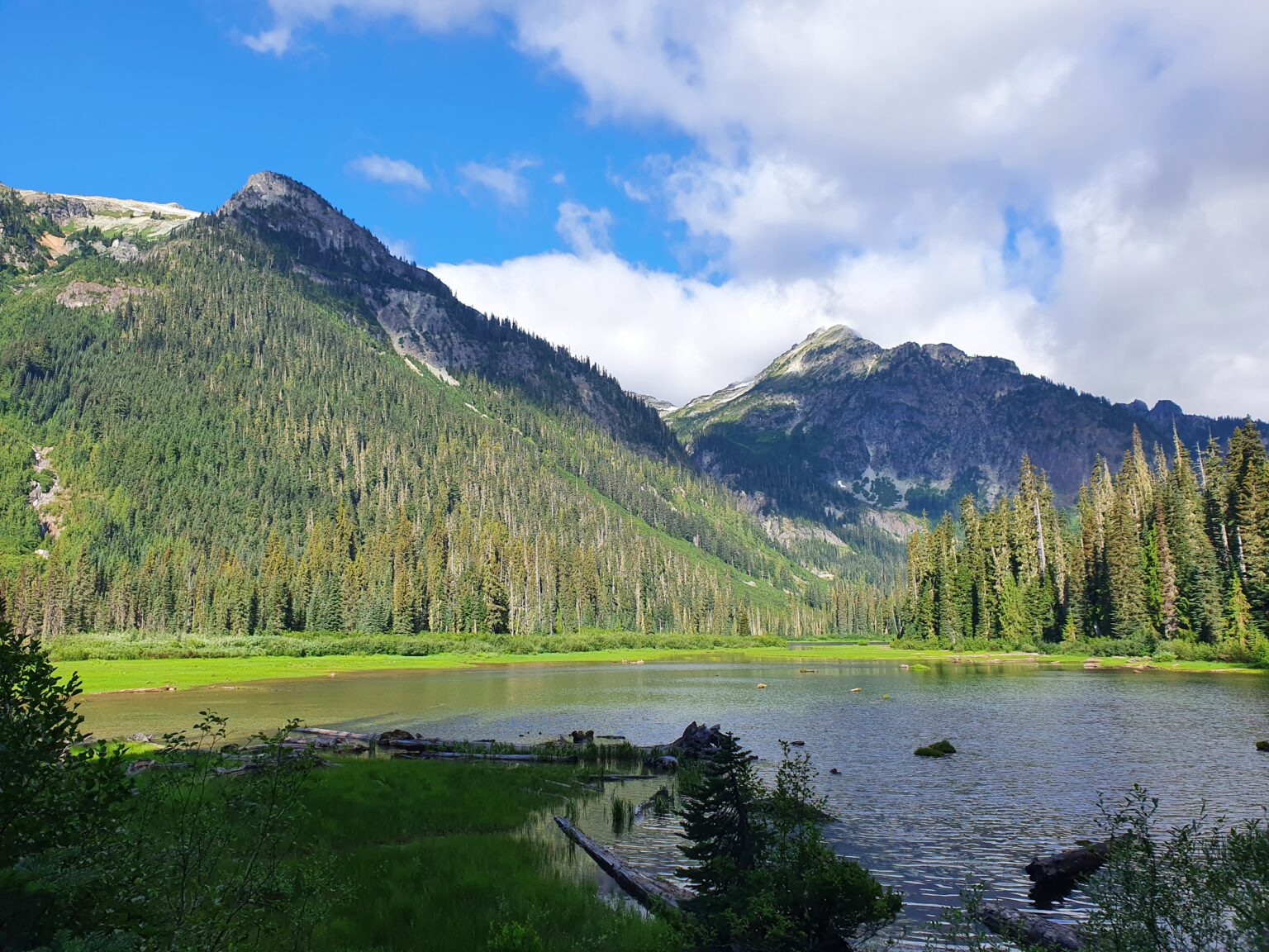 Hiking up the towards Robin Lake with Hyas Lake and Mount Daniel in the distance