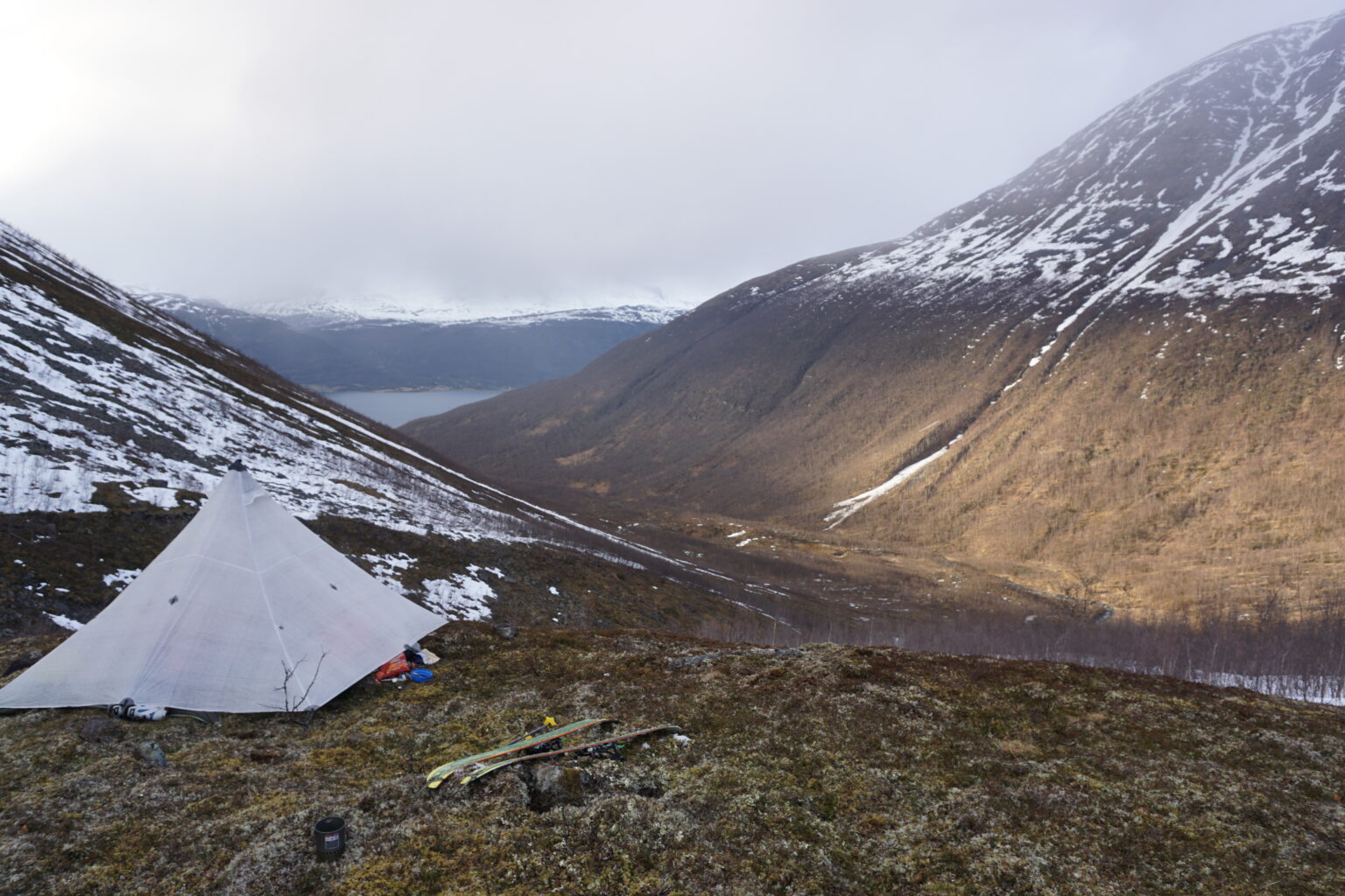 Setting up camp with a view of the Lyngen Fjord