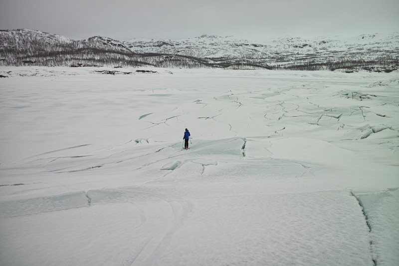 Skiing across a frozen lake on the Norwegian and Swedish Border