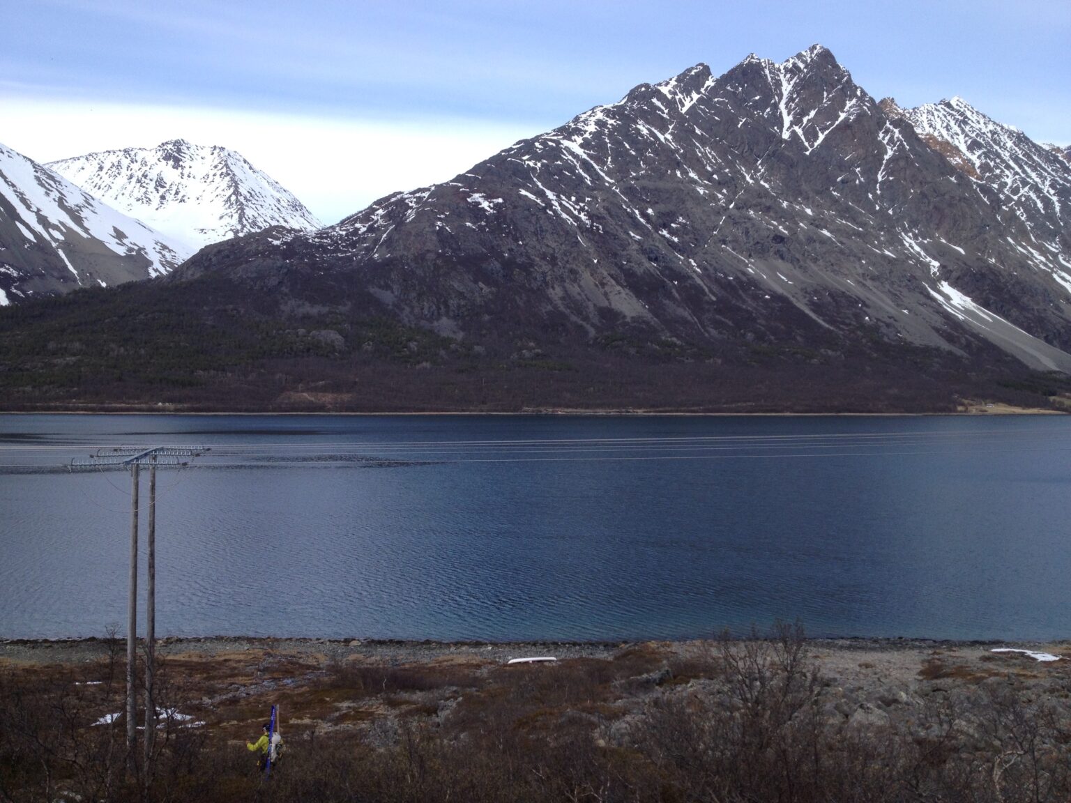 Heading back to the shore line with skis on our packs