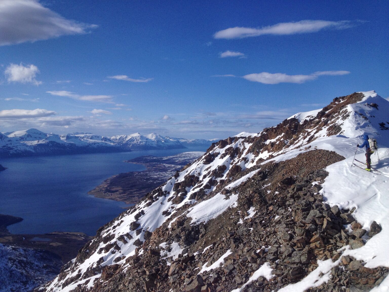 Skinning up to the North sub summit of Store Fornestinden