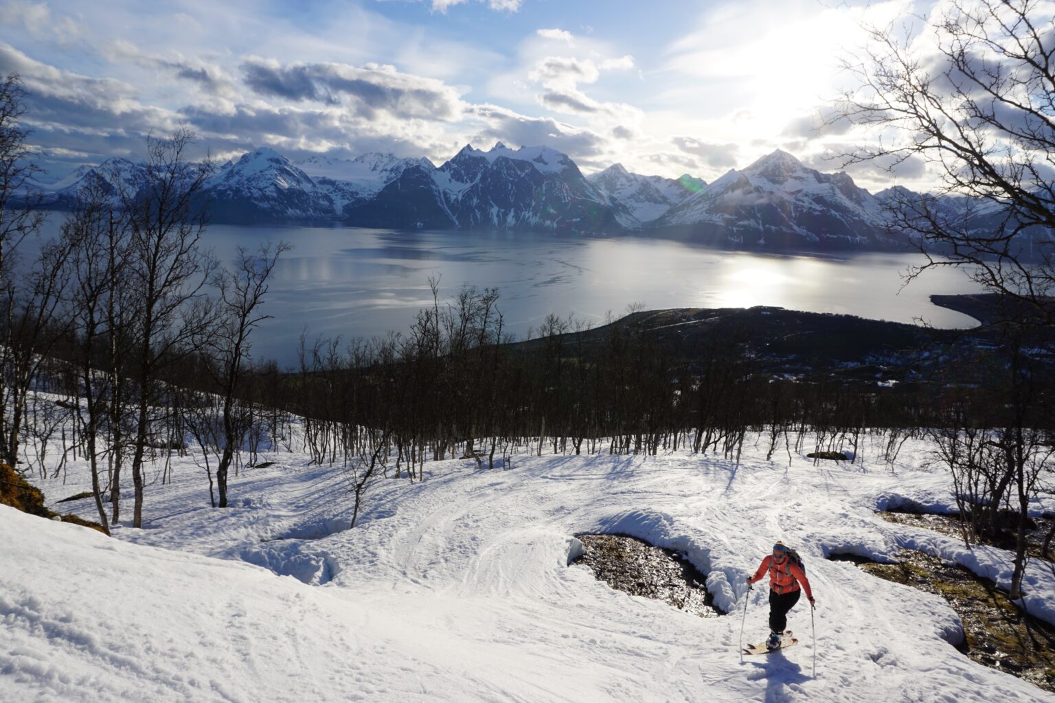 Skiing between the patches of snow