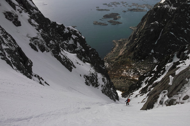 Skiing down the lower chute