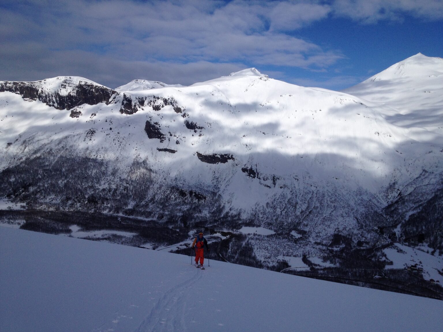 Hiking up the lower slopes of Vardtinden with the Lakseldalen Valley in the distance