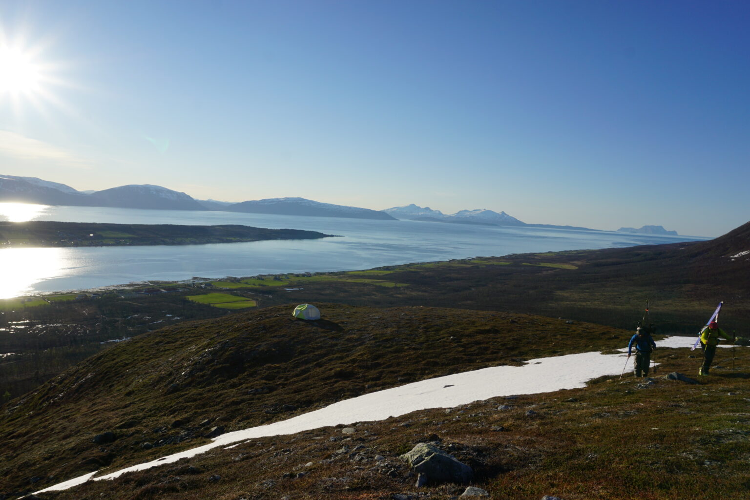 Leaving our camp on the lower ridge of Veidalsfjellet