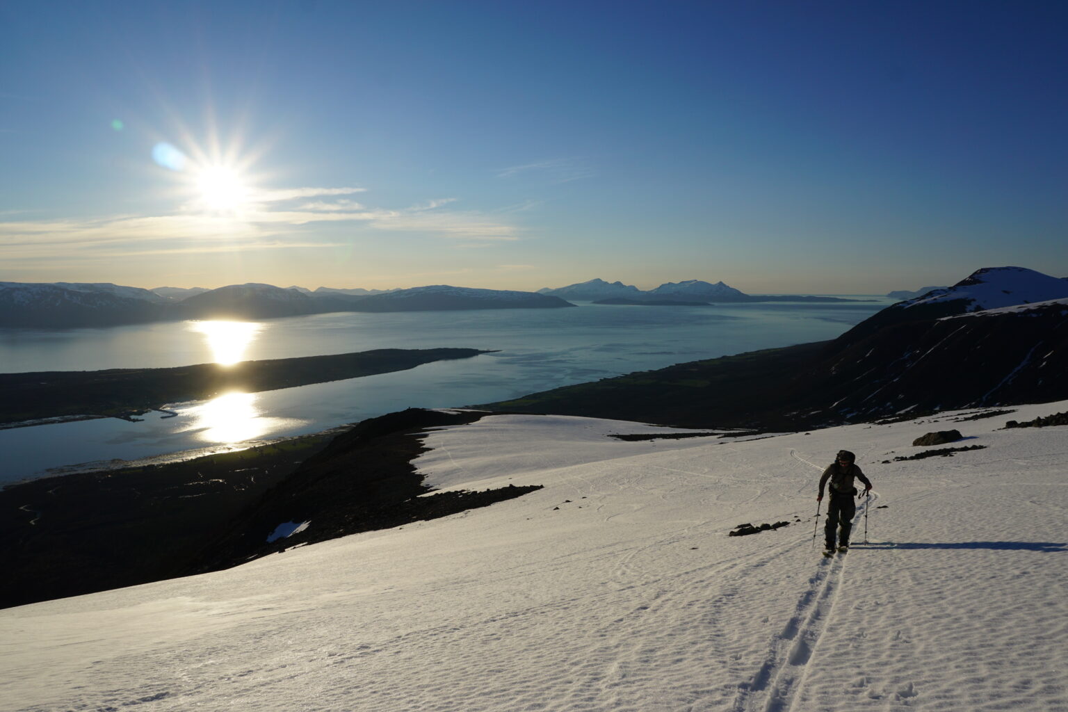 Ski touring up the ridge of Veidalsfjellet