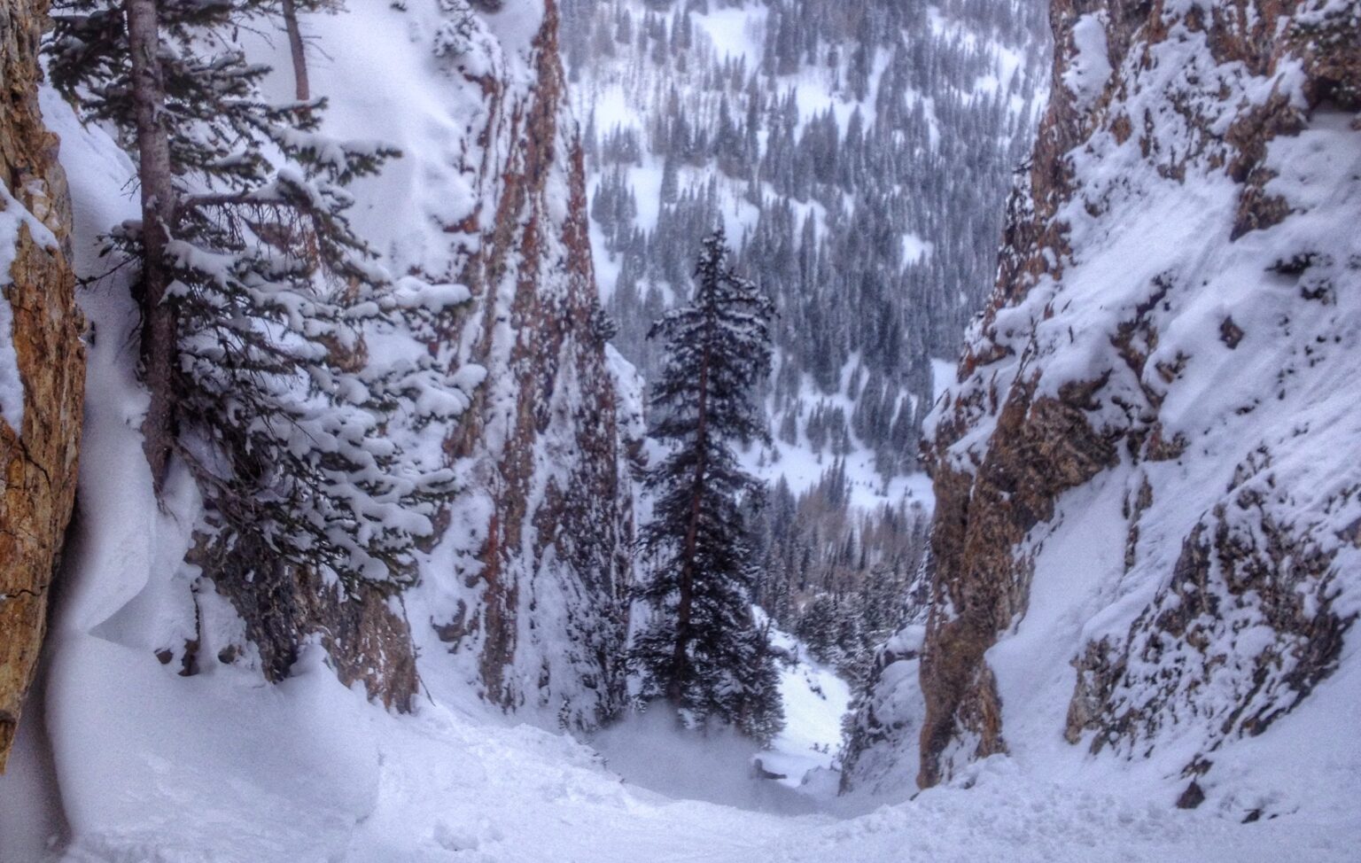 Snowboarding down Benson and Hedges in the Wasatch Backcountry of Utah