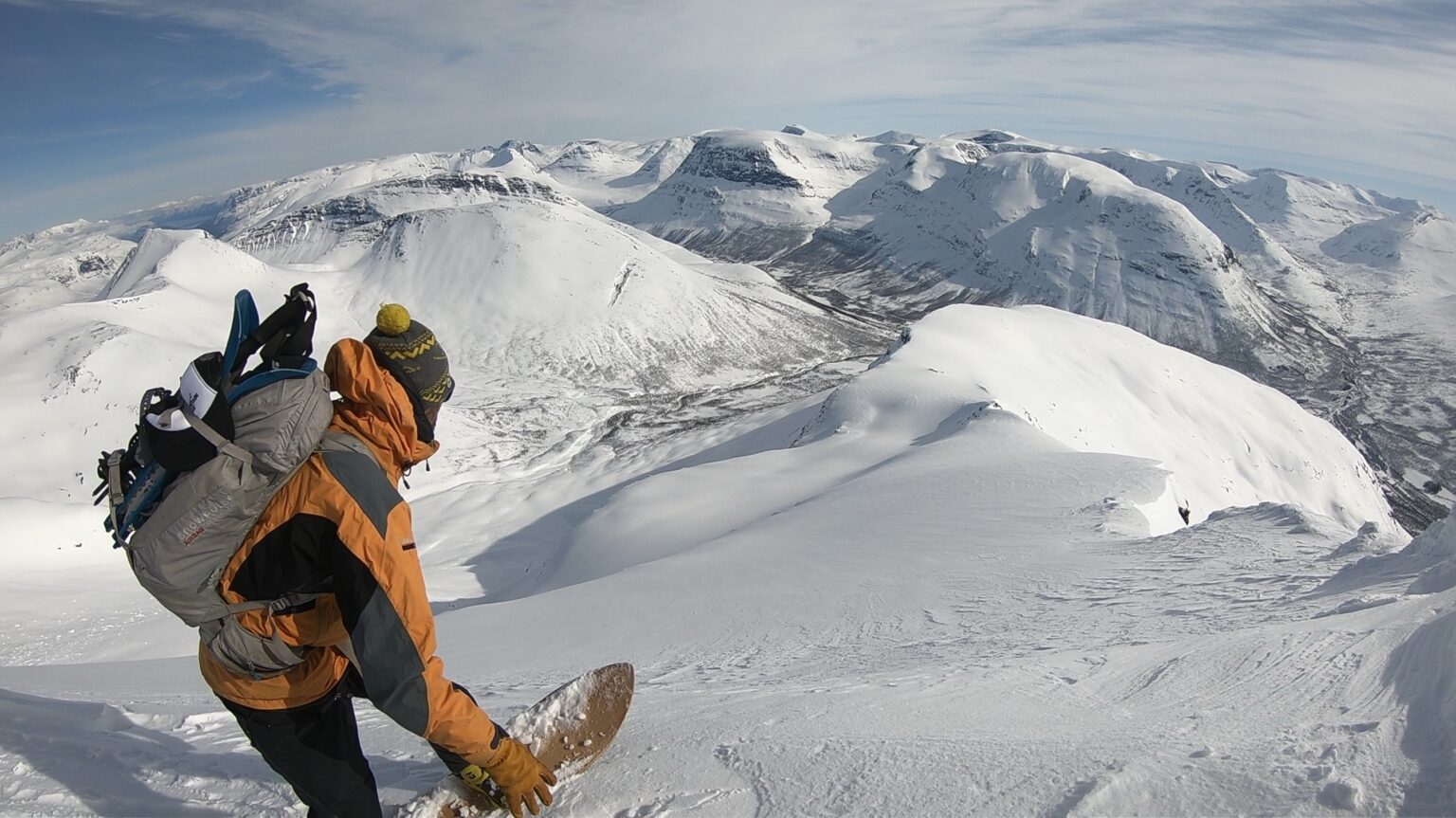Getting ready to snowboard into the Blåbærfjellet Northeast bowl
