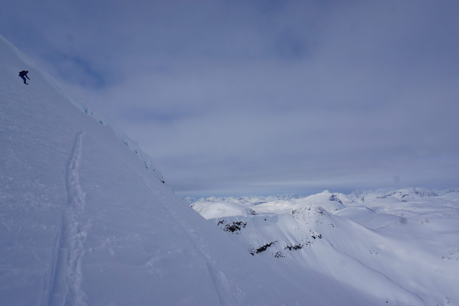 Traversing the upper face before riding Blåbærfjellet South face