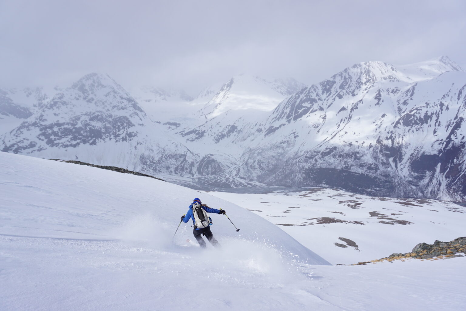 Skiing down the Northwest bowl of Daltinden in the Lyngen Alps of Norway