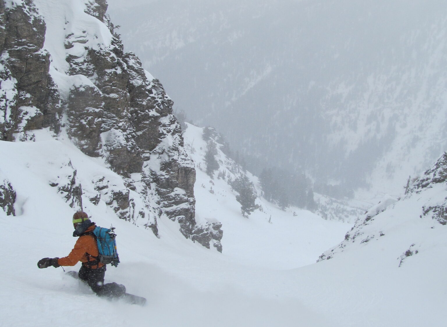 Snowboarding down the lower section of the East Chute on Kesler Peak