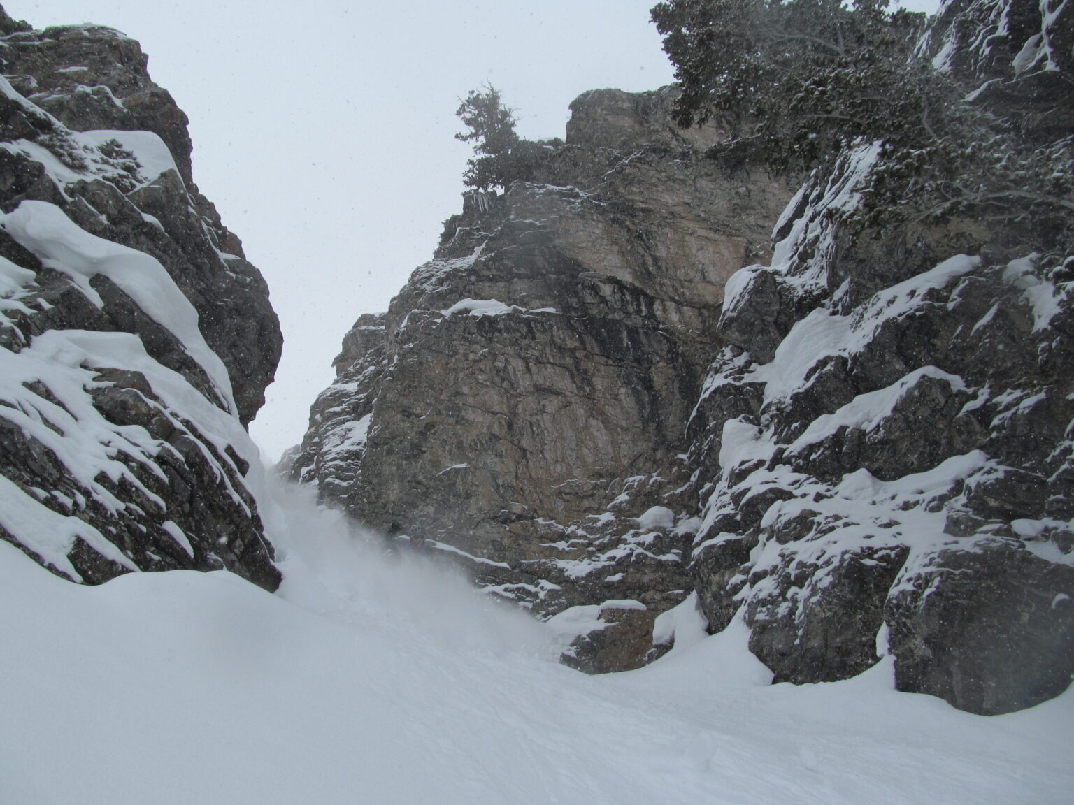 Snowboarding down the East Chute of Kesler Peak in power conditions