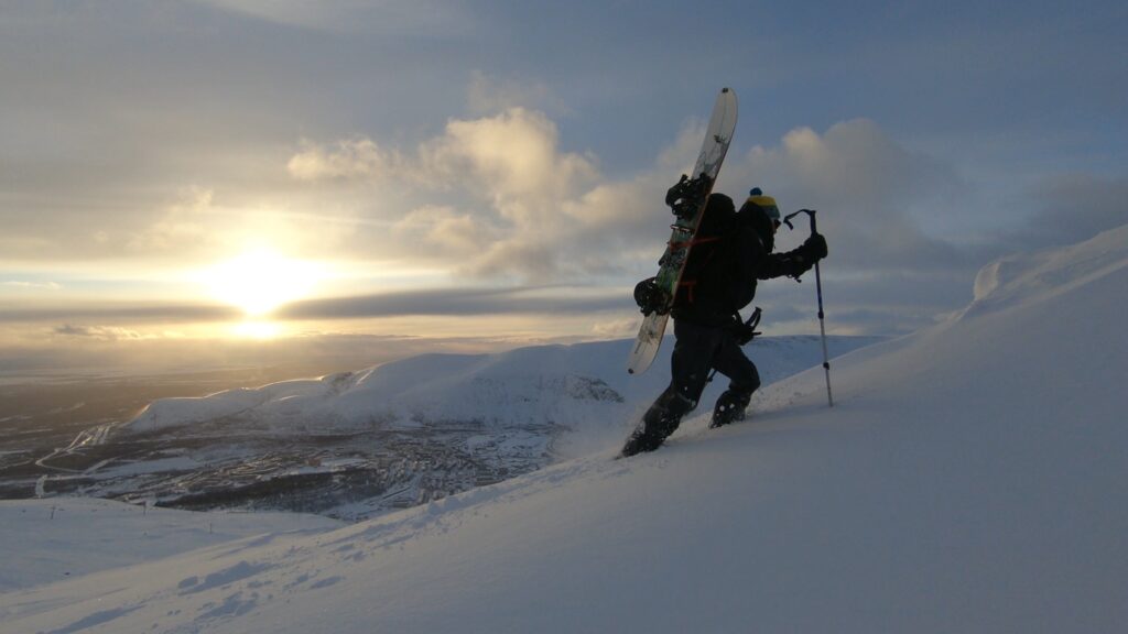 Hiking up the Bigwood Sidecountry as the sun starts to set