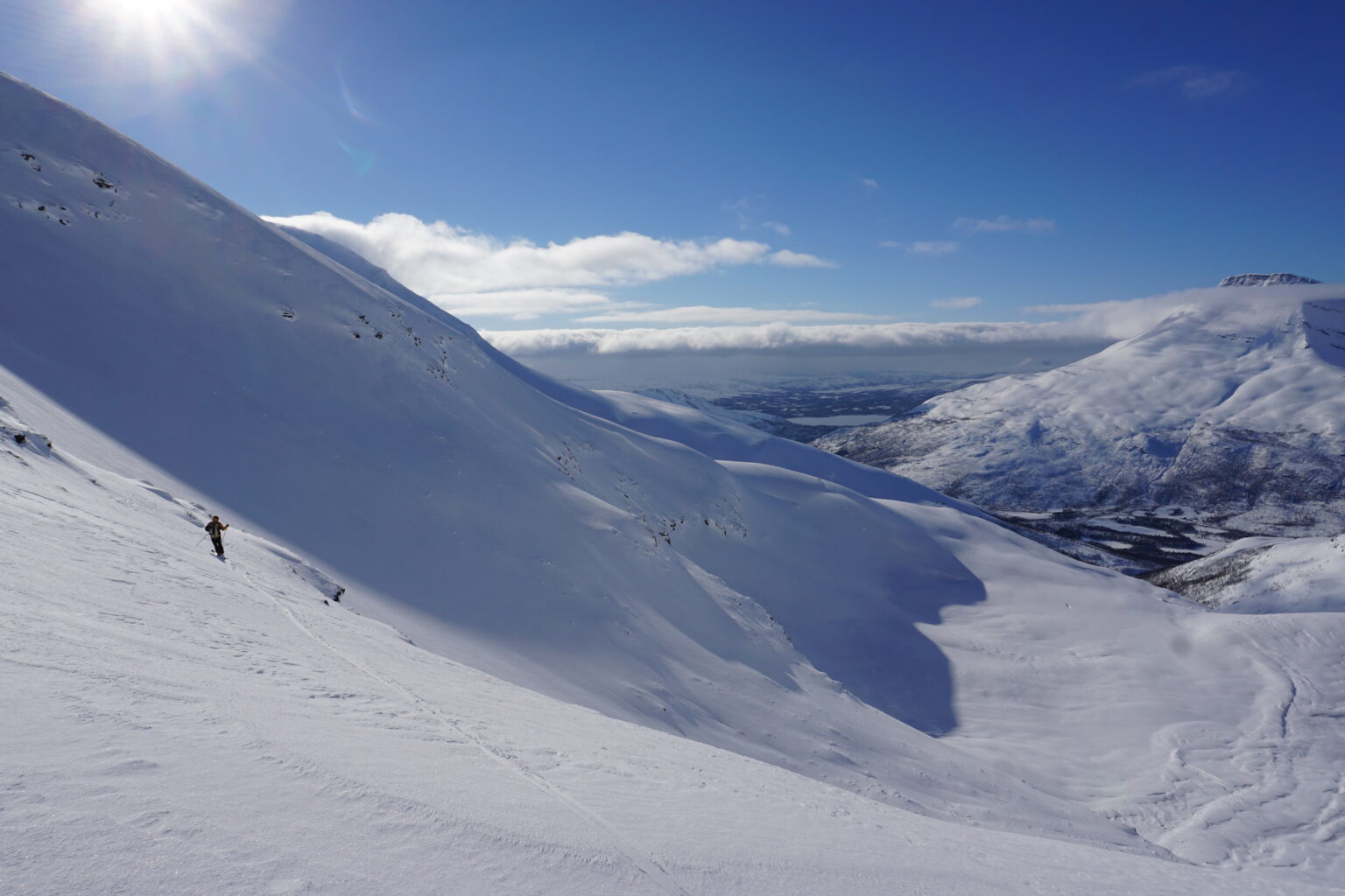 Skiing the lower section of Istinden East Bowl