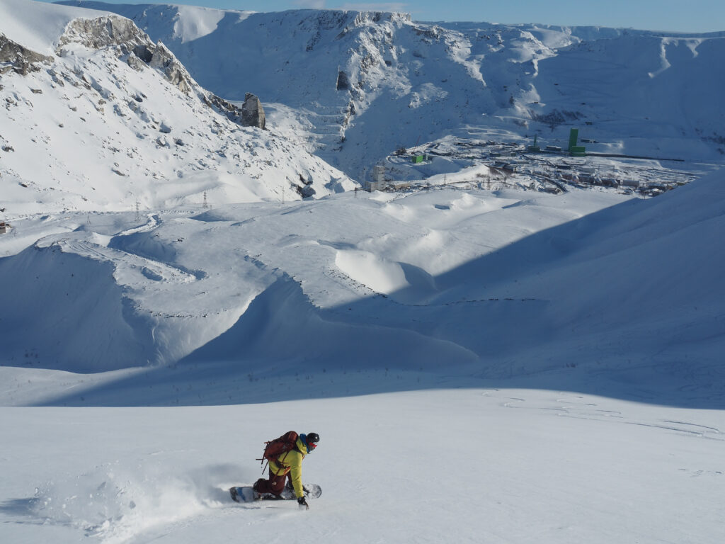 A perfect snowboarding day in the backcountry of 25 km ski center in the Khibiny Mountains of NW Russia