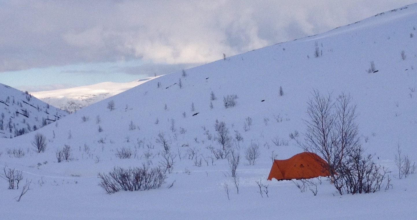 Setting up camp in the Kvalvikdalen Valley in the Lyngen Alps of Norway