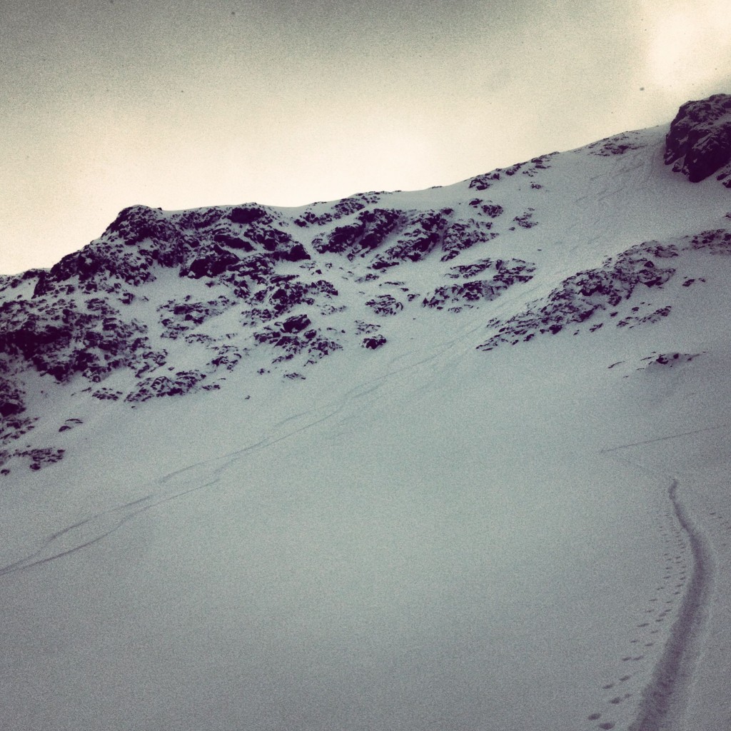 Looking at our ski tracks after riding down the Midnight sun