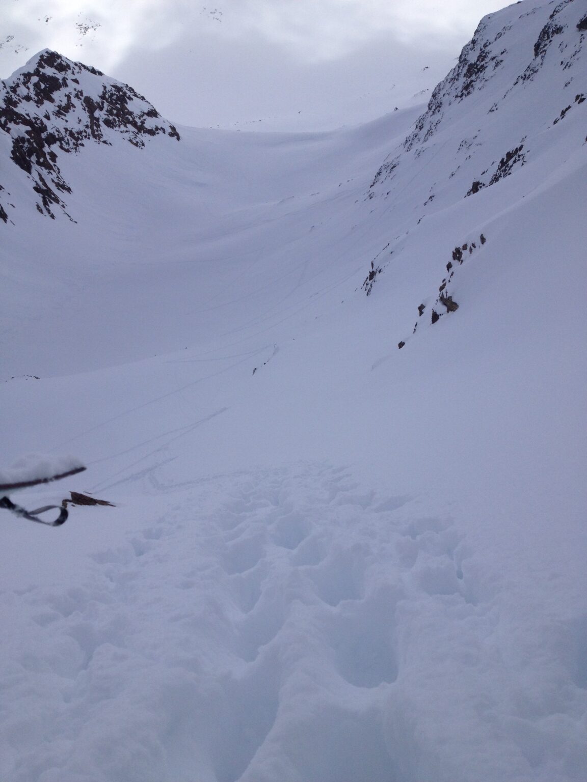 Bootpacking up to a low ridge to get some powder turn