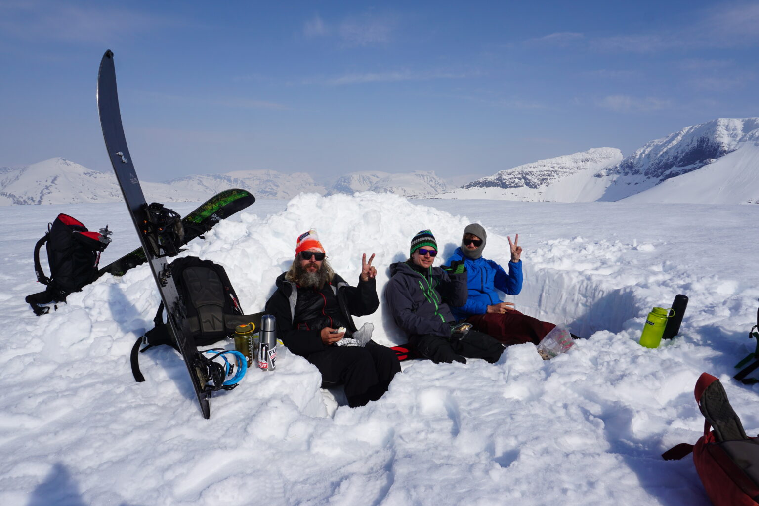 Making a snow shelter to stay out of the winds