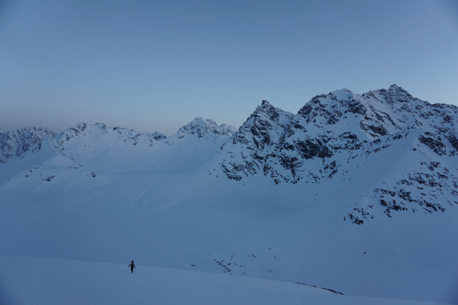 Hiking up to our next snowboard run during th Northern Loop