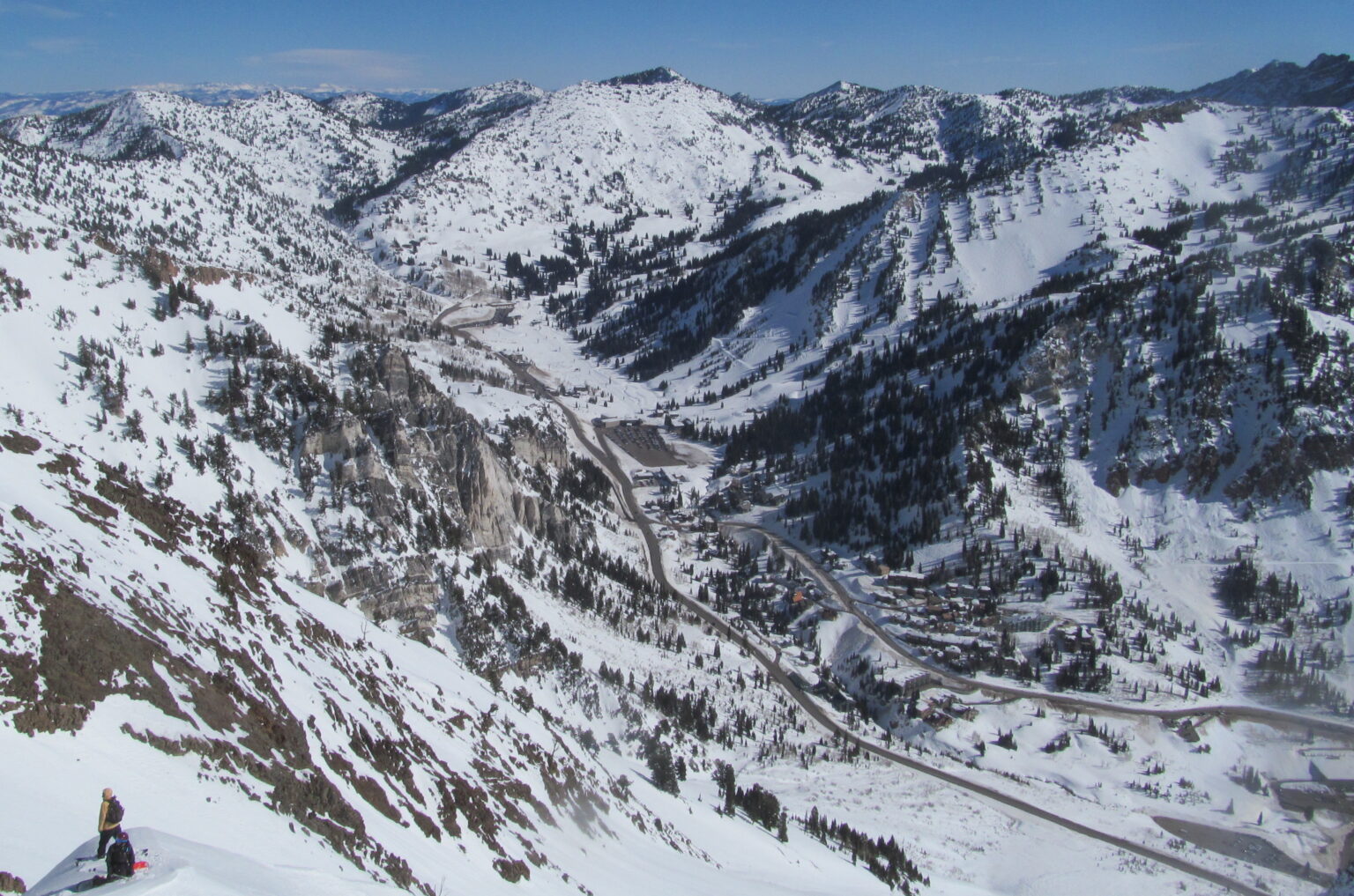 Getting ready to snowboard down the South Face of Mount Superior with the Little Cottonwood Canyon in the Background