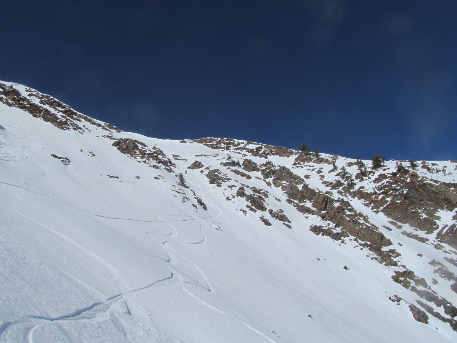 Snowboarding down the South face of Mount Superior