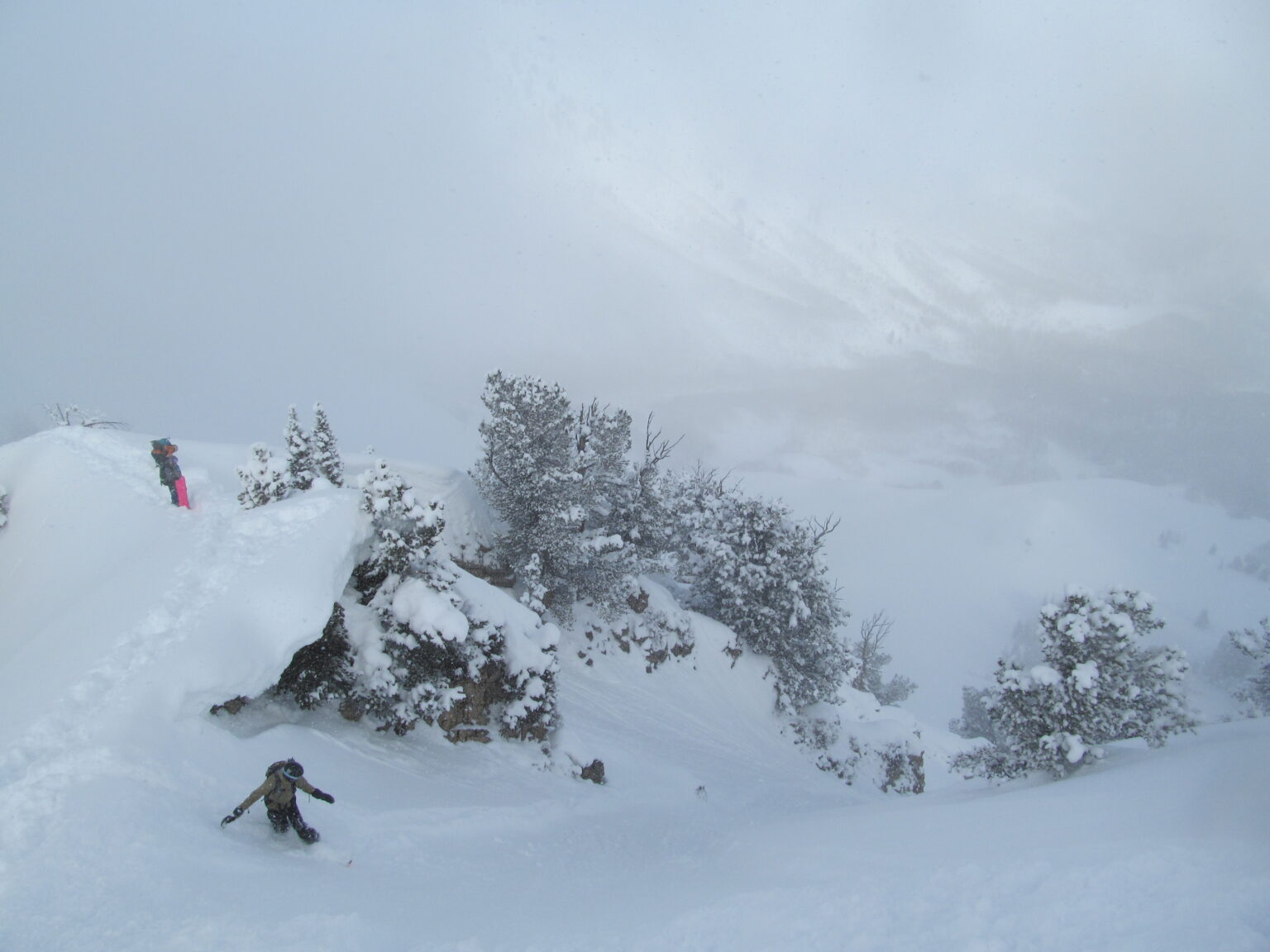 Snowboarding down the East face of Mount Raymond in the Wasatch Backcountry of Utah