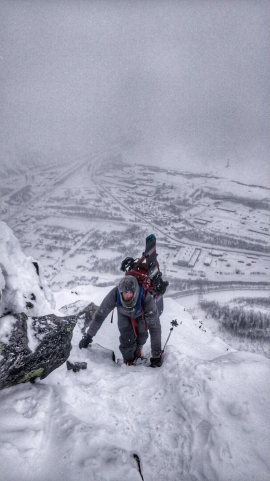 Crampon climbing with Kirovsk in the background