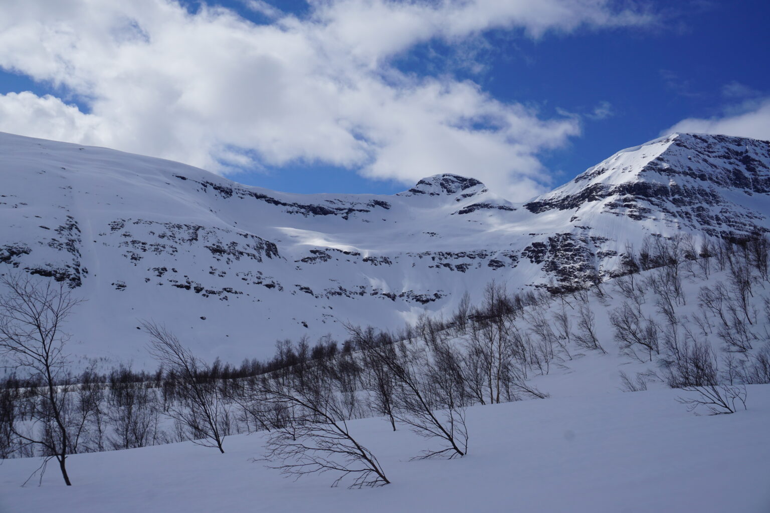 Looking up at the Northeast bowl of Sjufjellet while on the Sjufjellet, Lille Russetinden and Blåbærfjellet Traverse