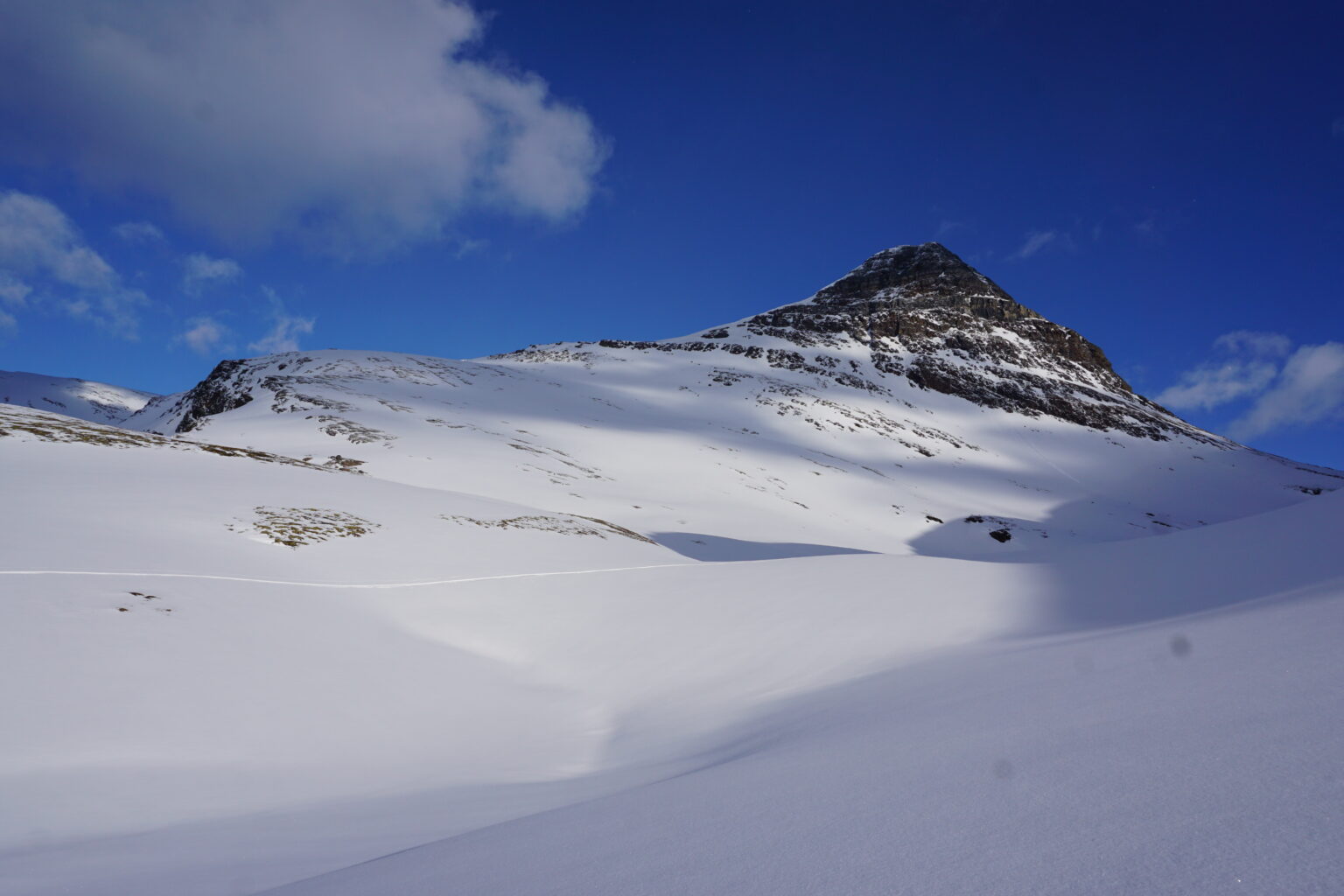 Ski touring up to the next col