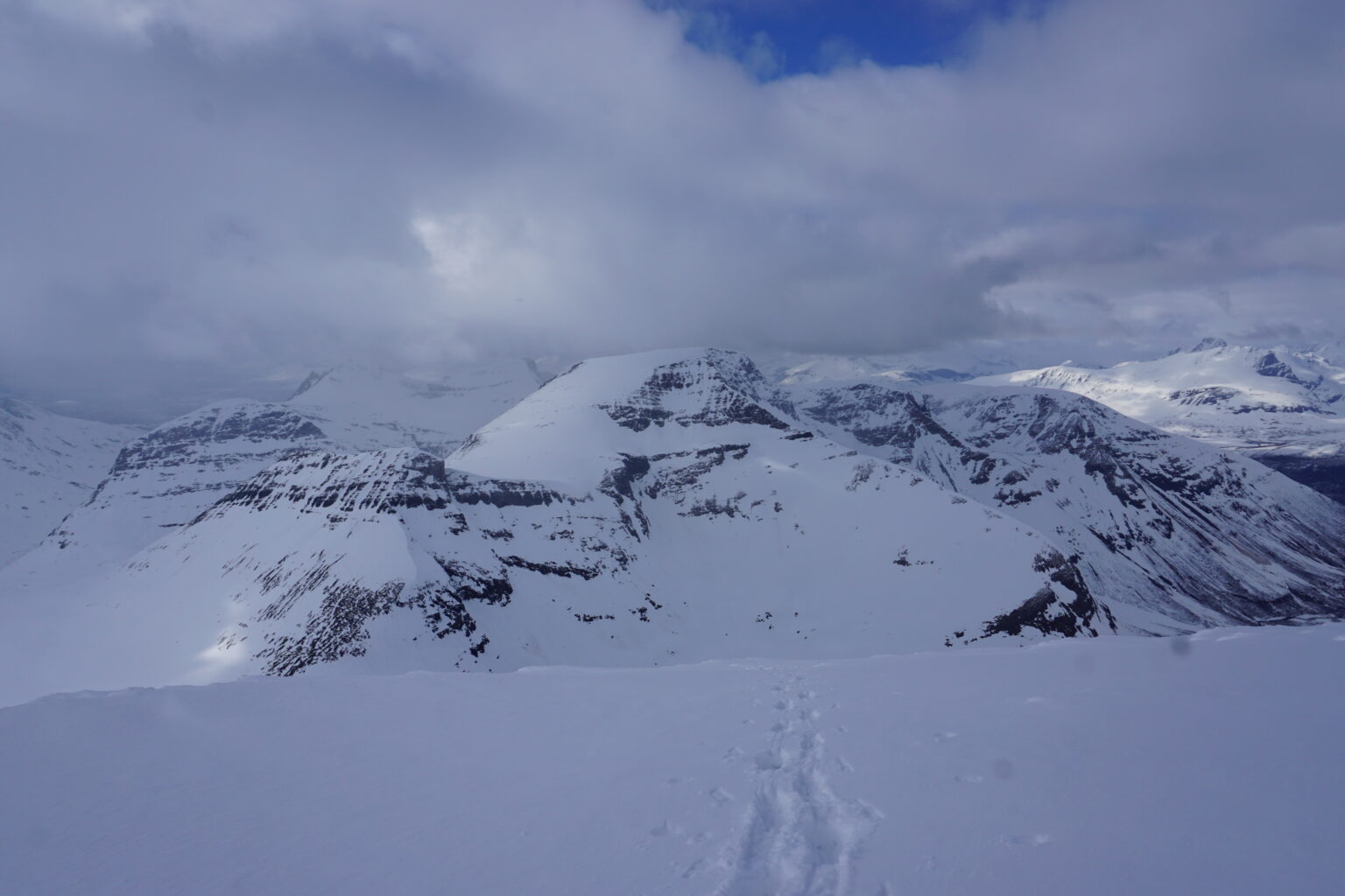 Climbing up the North face of Lille Russetinden while on the Sjufjellet, Lille Russetinden and Blåbærfjellet Traverse