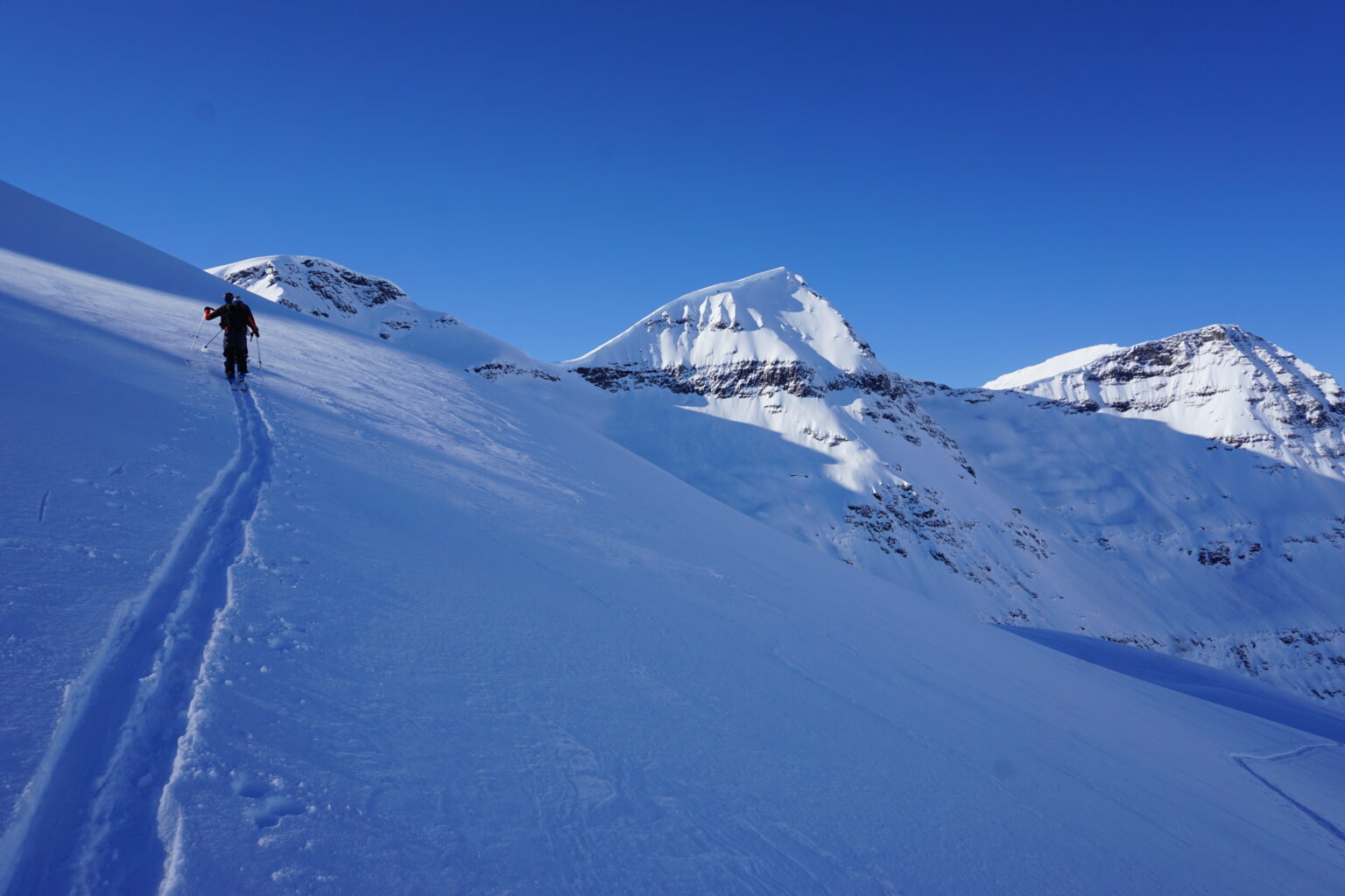 Ski touring to the summit of Sjufjellet in the Northeast bowl