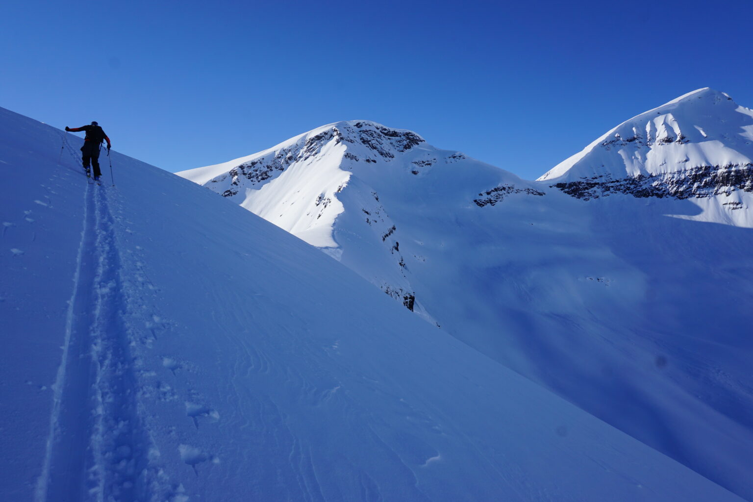 Skinning up to the summit of Sjufjellet