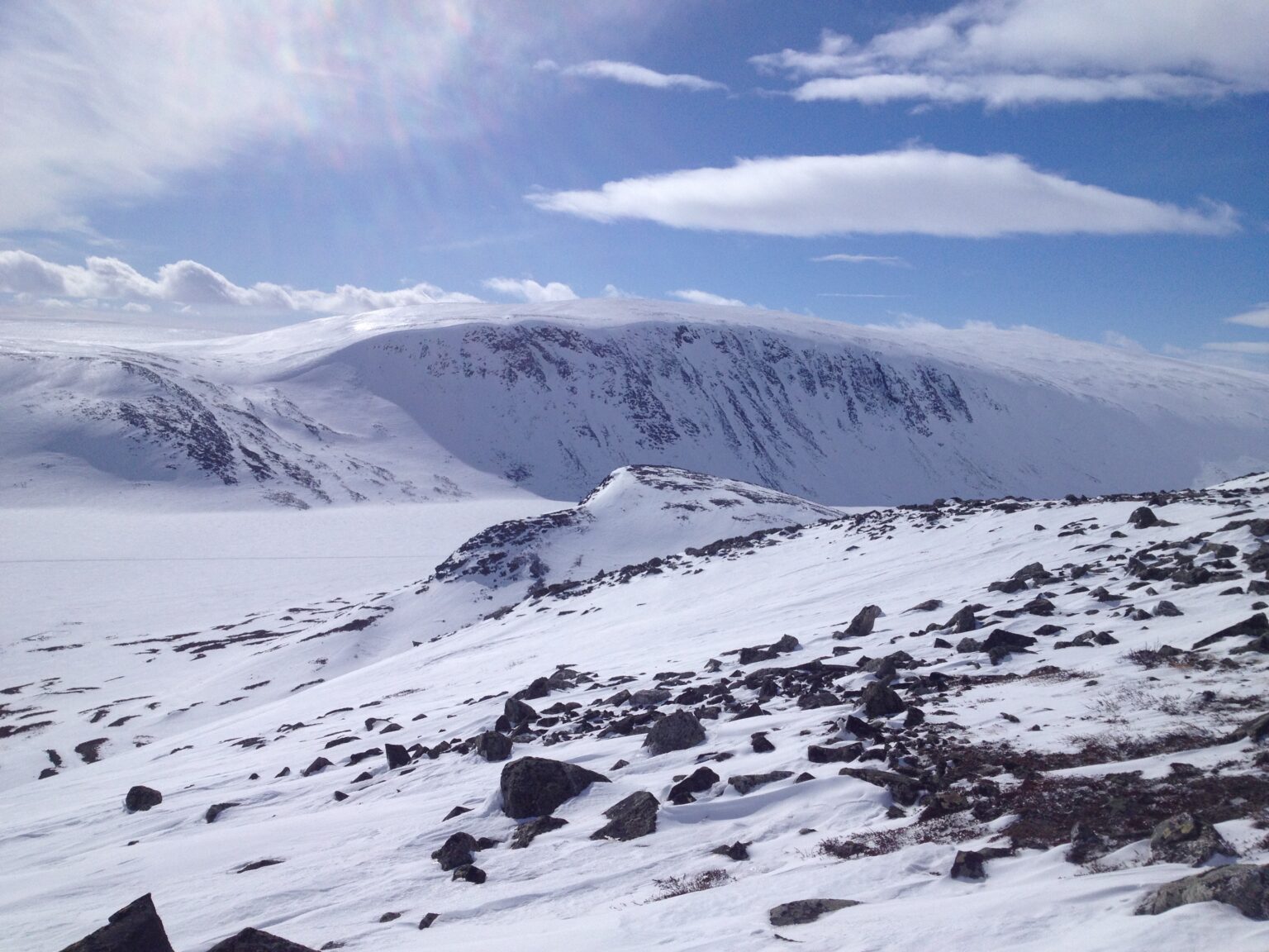 Looking at steep ski mountaineering terrain in Finnish Lapland