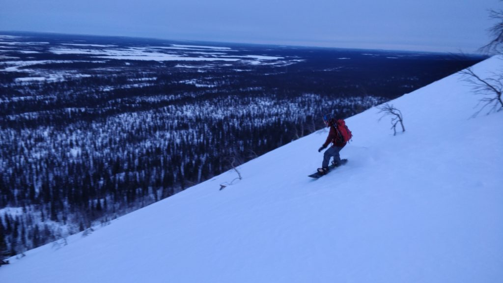 Snowboarding with Arctic Russia in the background