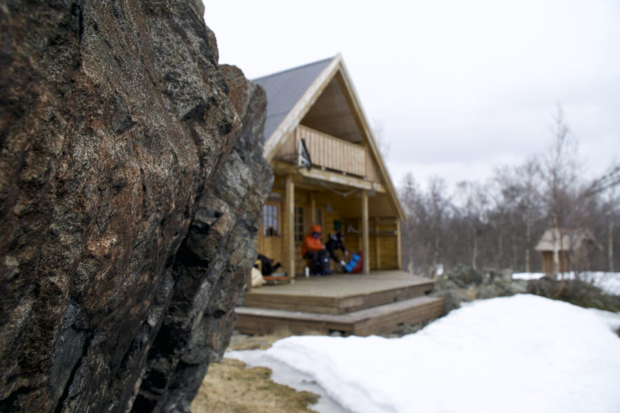 Finding shelter on the balcony of a hut