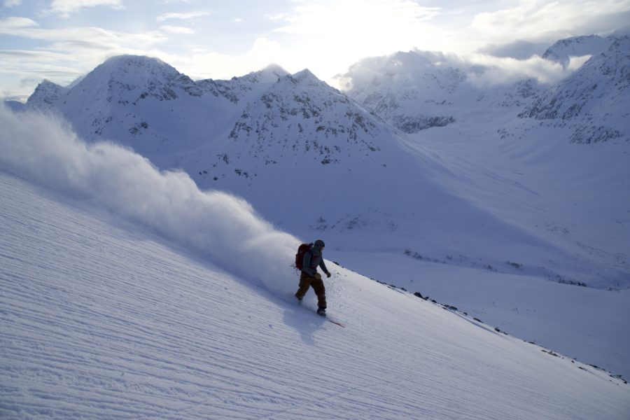 Making powder turns while doing the Lyngen Alps Traverse in Northern Norway