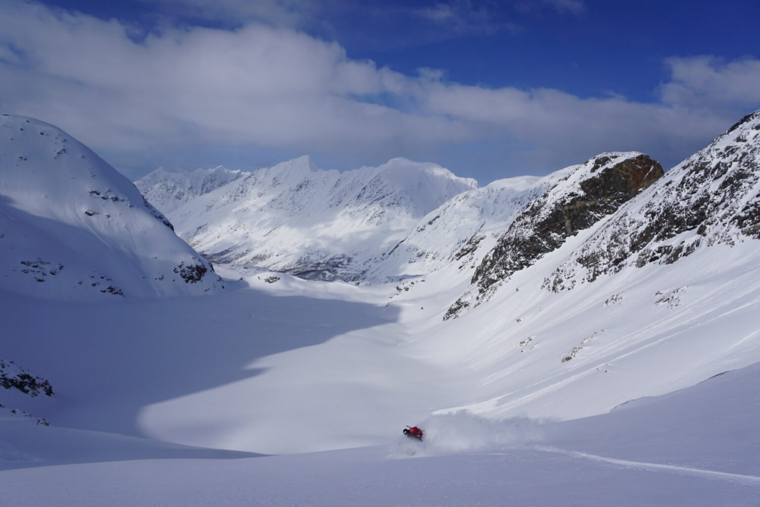 A blue sky powder day while on the Lyngen Alps Traverse