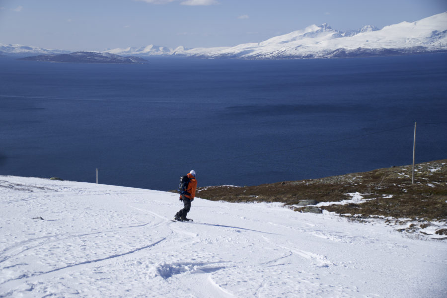 Snowboarding all the way to the Arctic Sea while on the Lyngen Alps Traverse