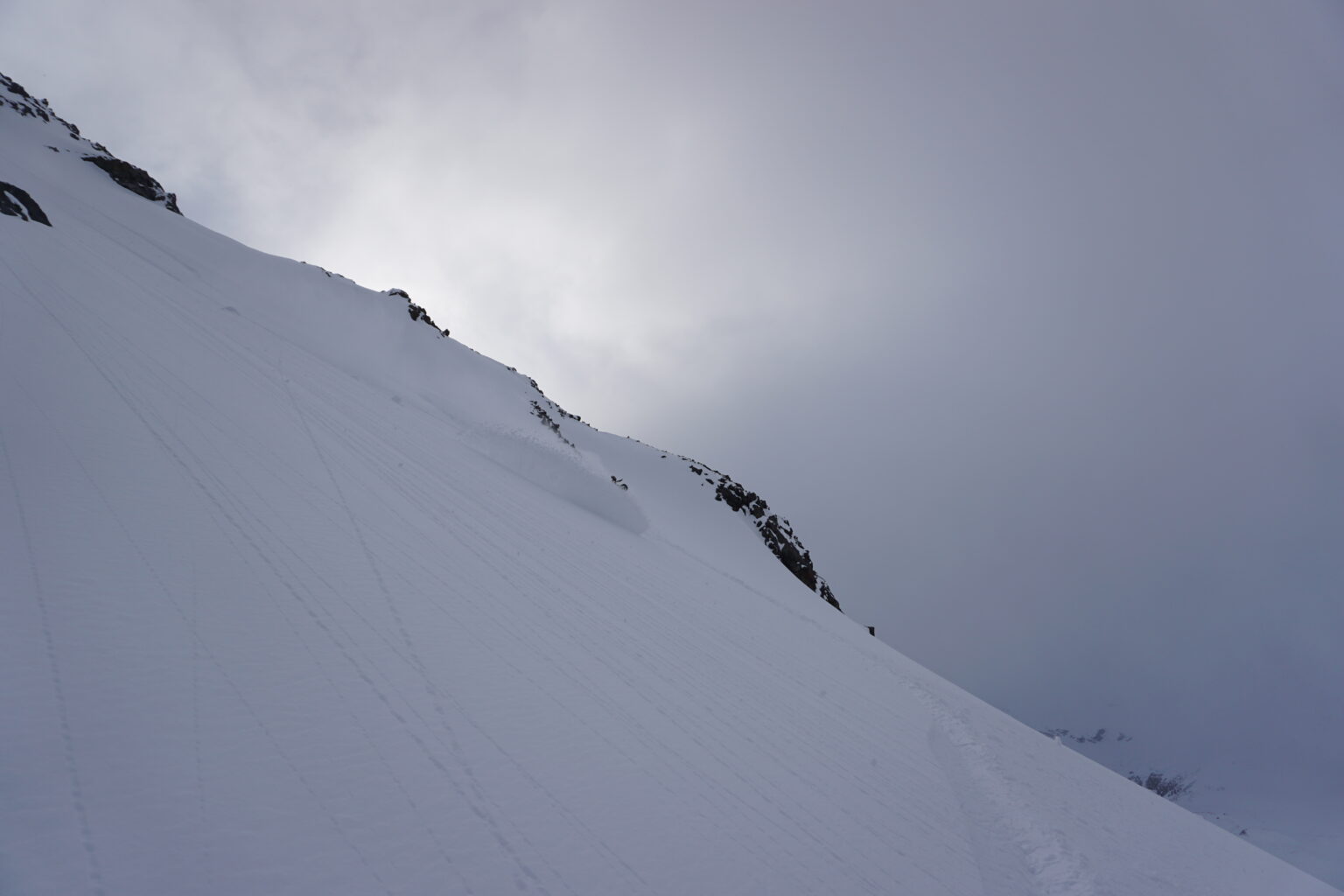 Kicking up powder snow on the Lyngen Alps Traverse