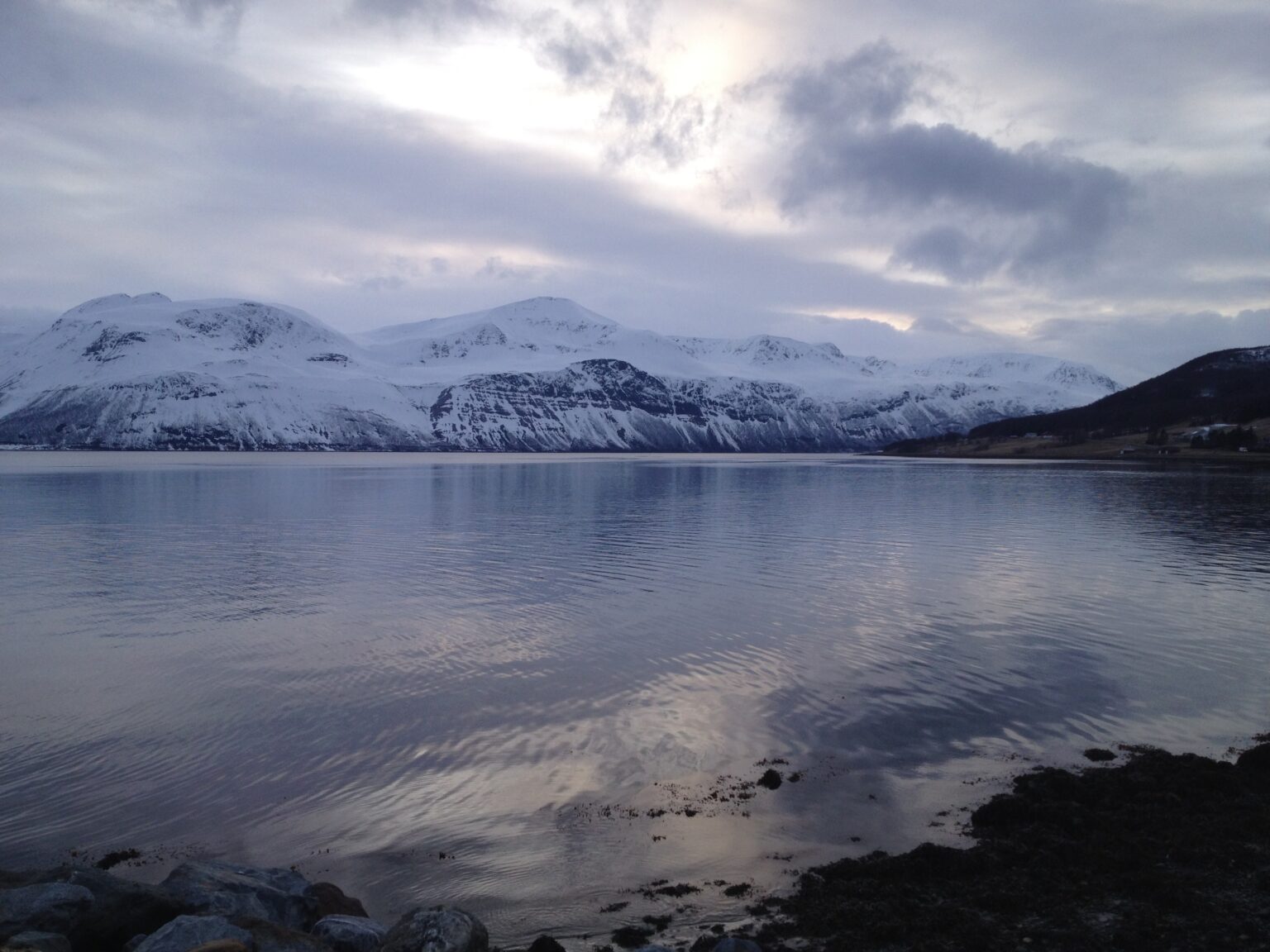 Looking across the fjord towards the Lyngen Alps of Northern Norway