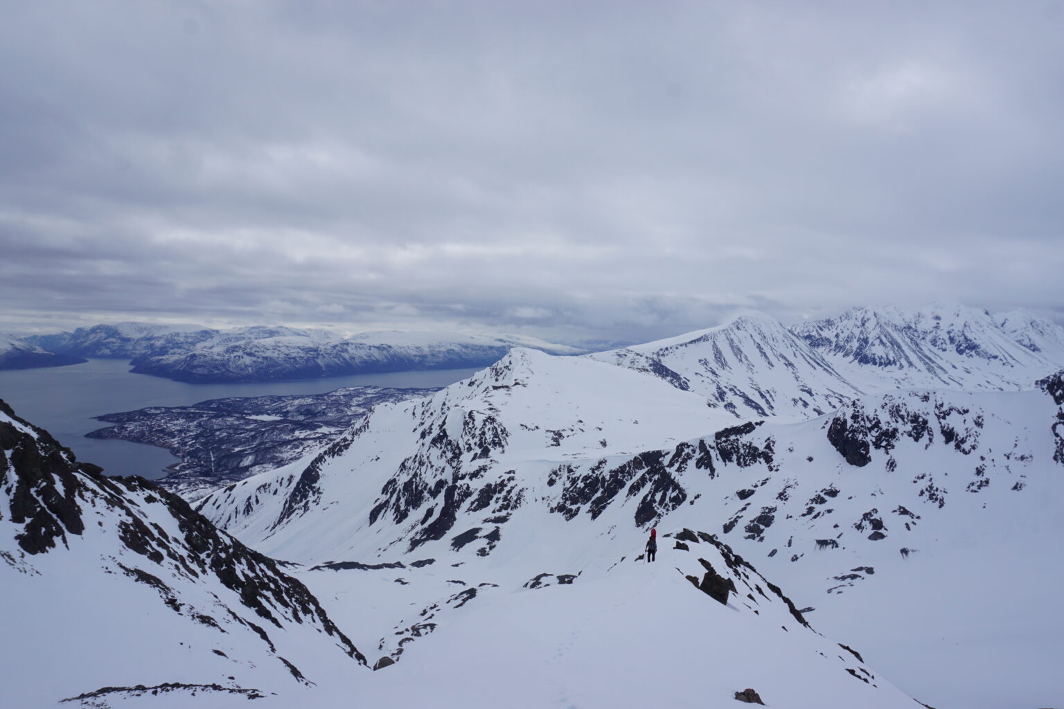 Climbing up the Southwest bowl of Store Koppangstinden in the Lyngen Alps of Norway