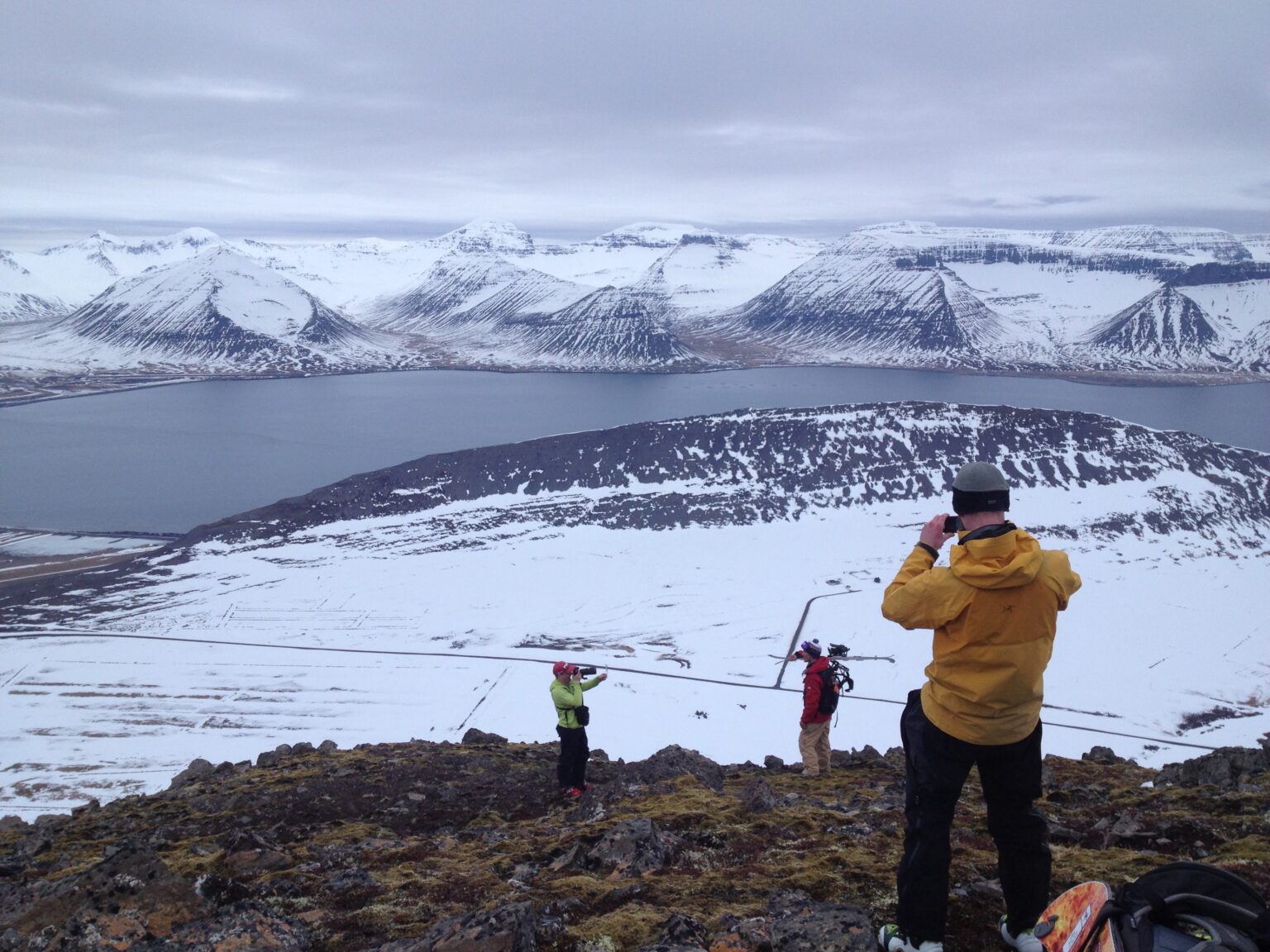 A photo of a photo of a photo with Dýrafjörður in the background