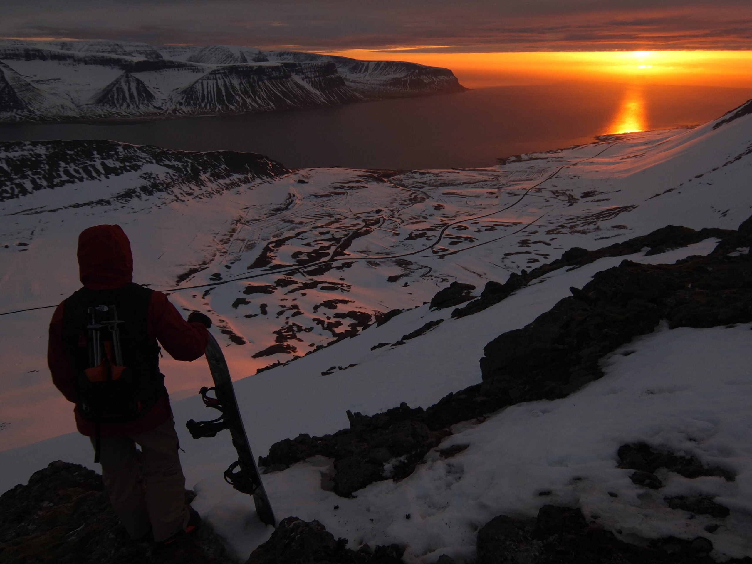An epic sunset while standing on a summit with Dýrafjörður below us