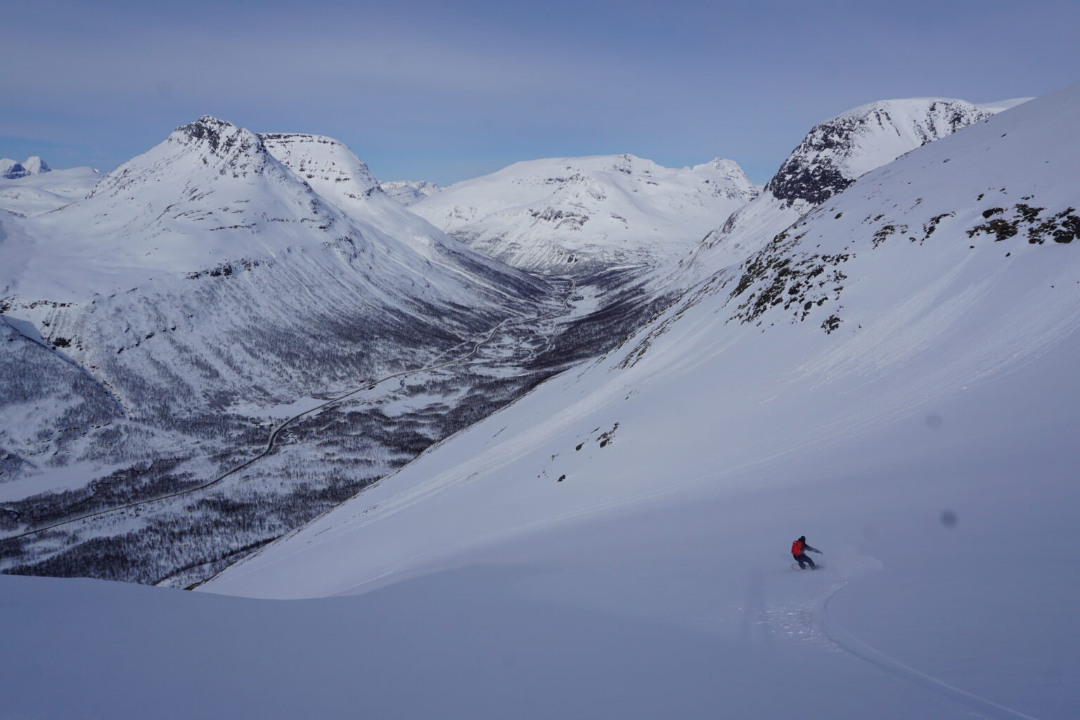 Snowboarding down the lower slopes