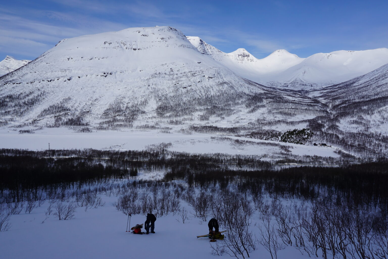 Heading higher up the slopes with the Tamokdalen backcountry in the background