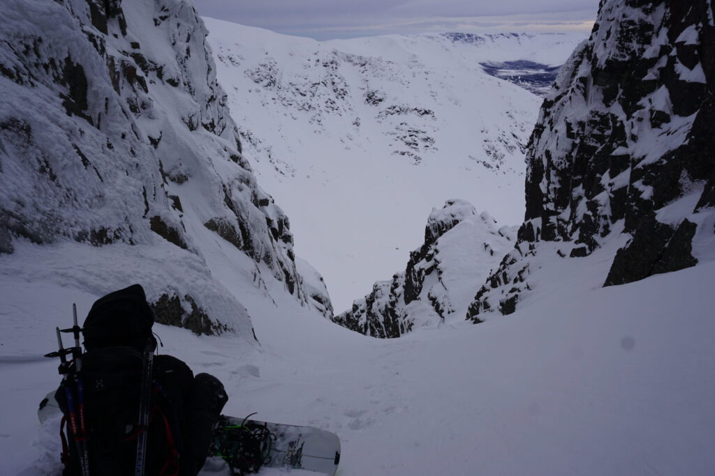 preparing to snowboard down the north chute on Mount Aikuaivenchorr